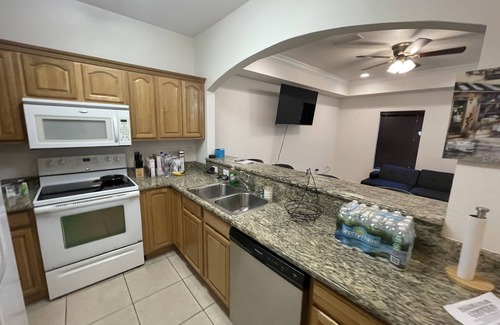 Gainesville Condo | Charming Spanish-style condo nestled in the quiet Royal Park area of Gainesville