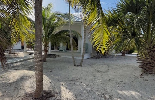 Sandy Point Cottage | Charming Spectacular Secluded Cottage, Large pool, Tennis, Private Community