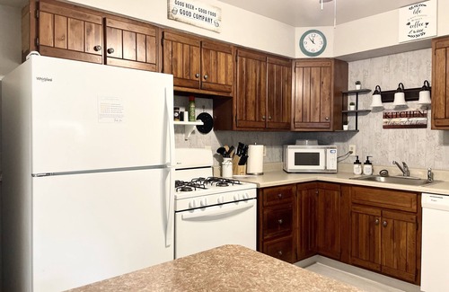 Girard House | Charming three bedroom home with spacious deck, near Elk Creek