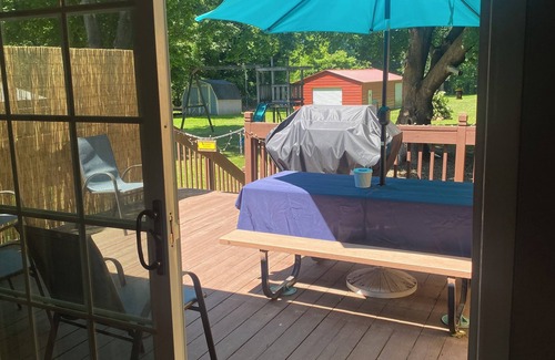 Girard House | Charming three bedroom home with spacious deck, near Elk Creek