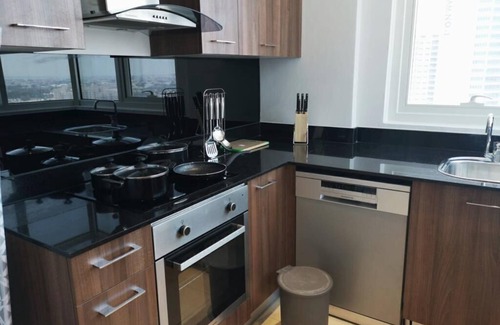 Sanabis House | Charming tower with 1 bedroom, WiFi, Gym, pool in the Middle of the Cityn