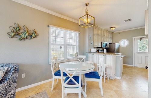 Marathon House | Charming townhome with ocean views, an open porch & steps from the water