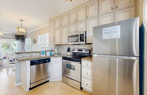 Marathon House | Charming townhome with ocean views, an open porch & steps from the water