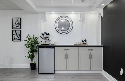 Port Hope House | Charming walk out basement fitness room, hot tub in enchanting Port Hope