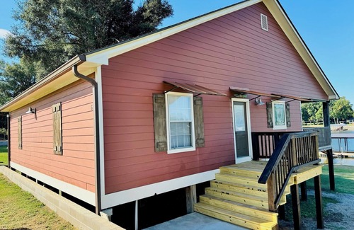 Acme House | Charming waterfront property located on lovely Black River Lake in Monterey, LA