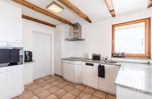 Engadin Scoul Apartment | Chasa La Tschuffa: Exclusive house with 4.5-room maisonette at the foot of Tarasp Castle
