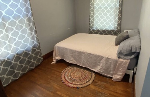 Atchison House | Cheerful 2 Bedroom Home with Parking and WiFi