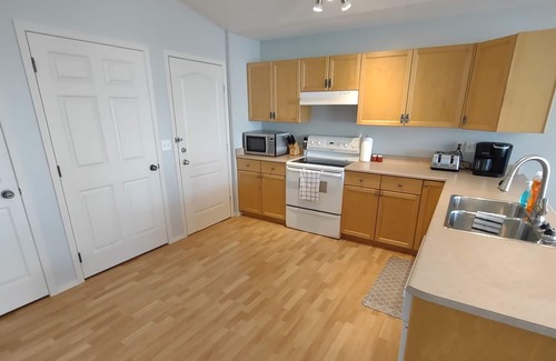 Grande Prairie House | Cheerful 3 Bedroom Home - Fully Stocked, Clean & Pet Friendly!