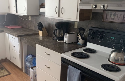 West Central Saskatchewan Cottage | Cheerful 3 Bedroom Cottage with Fireplace.