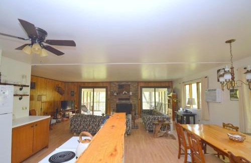 Great Cacapon House | Chesnutt Cabin - Riverfront, Fire Pit, Game Room, Wifi, Screen Porch, View, King Bed