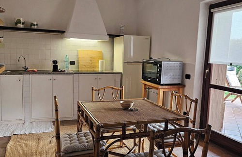 Chia Apartment | Chia, Sardinia Large Apartment 200 meters from the sea with Terrace and Garden