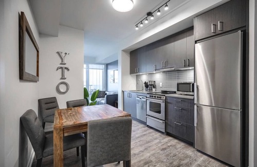 Church and Wellesley Apartment | Chic 2BR Oasis with Skyline Views near Berczy Park