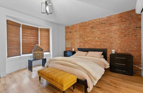 The Danforth Apartment | Chic 2BR Top Floor Retreat with Rooftop Near Subway
