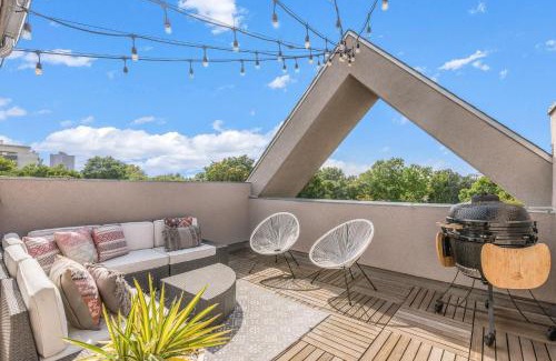 City Park West House | Chic City Park Home - Rooftop Deck - Skyline Views