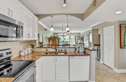 Capri Isle Condo | Chic condo near St. Petersburg w/pool & waterway views - walk to beach