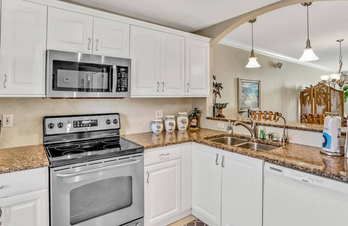 Capri Isle Condo | Chic condo near St. Petersburg w/pool & waterway views - walk to beach