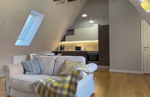 Pohja-Tallinn Apartment | Chic Old Town Apartment with Soaring Ceilings and Modern Comforts