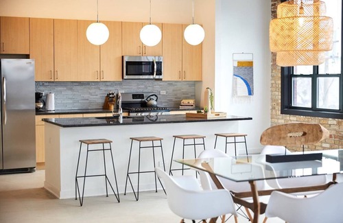 West Loop Apartment | Chic Penthouse Corner 3BR Loft In Fulton Market | Featured In Architectural Dige