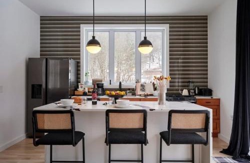 Roscoe House | Chic Renovated Chalet with Private Pond
