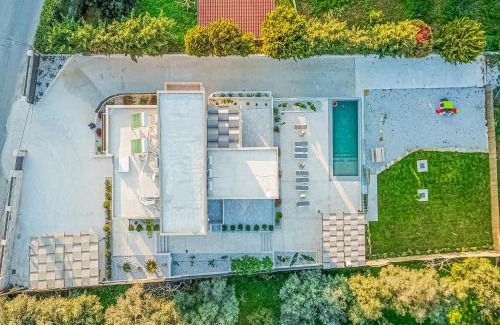 Mourniai Villa | Chris and Stratos villa with private ecologic pool and kid's playground!