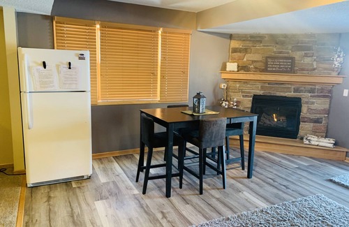 Ham Lake Condo | City country, small Lake view, hot tub, game room fire place & lots of extras!