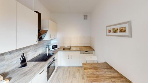 Borna-Heinersdorf Apartment | Citynah und im Grünen gelegen, WLAN