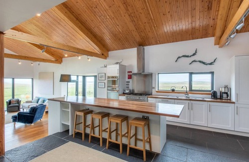 Isle of North Uist Cottage | CLACHAN LODGE, pet friendly, with a garden in Lochmaddy, North Uist