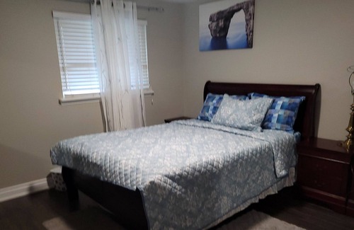 Durham Region House | Clean apartment with 4 free parking spaces.