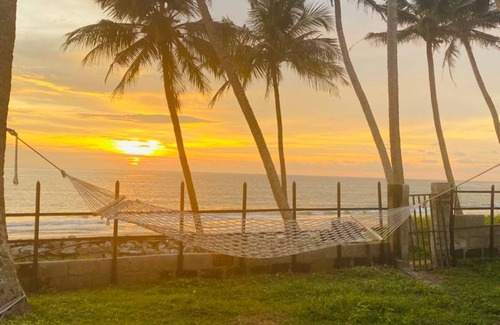 Paravur Ski Chalet | Cliff beach chalet with private beach access near Varkala.n