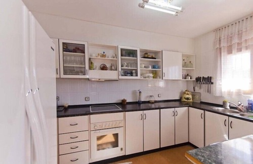 Sils Villa | Club Villamar - The lower part (pool level) has a dining room and a kitchen.