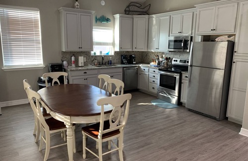 Matagorda House | Coastal Cabana! Three bedrooms and a lighted pier on the river!