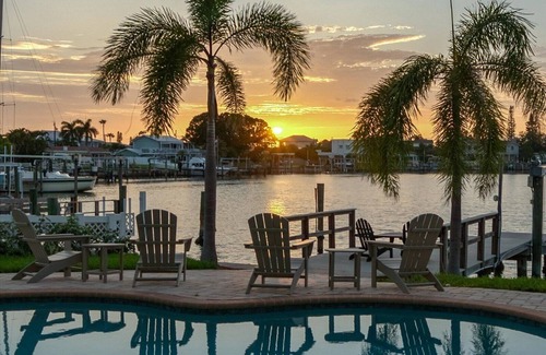 Indian Rocks Beach House | Coastal Elegance: Retreat with Heated Pool, Golf Cart, and Entertainment Haven