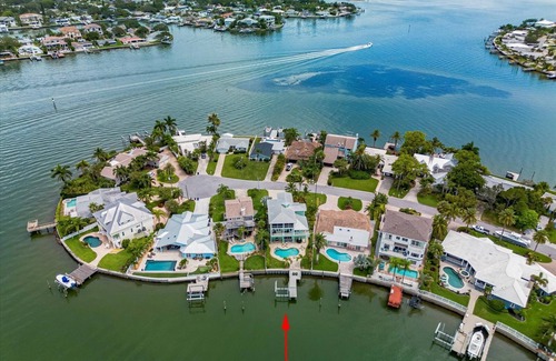 Indian Rocks Beach House | Coastal Elegance: Retreat with Heated Pool, Golf Cart, and Entertainment Haven