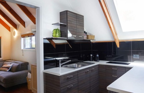Mermaid Waters Apartment | Coastal Gem with Indoor Skateramp