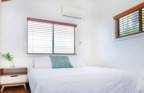 Mermaid Waters Apartment | Coastal Gem with Indoor Skateramp