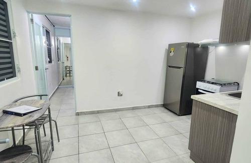 Levittown Apartment | Coastal Getaway: Steps from Shops, Dining & A Mile to the Sands
