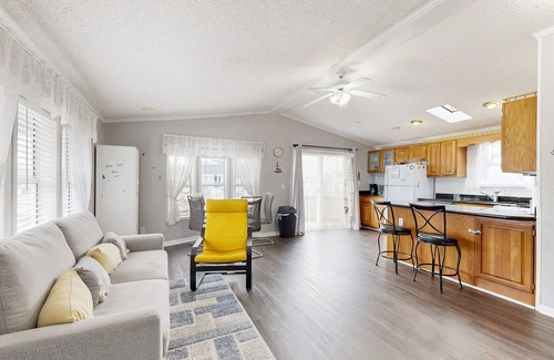 Assateague Pointe House | Coastal living with on-site pool, playground, grills, central AC, & washer/dryer