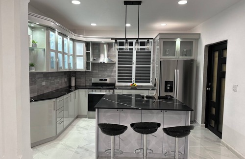 Islote House | Coastal Private Home 3 bedrooms 3 bathrooms all amenities steps away from Beach