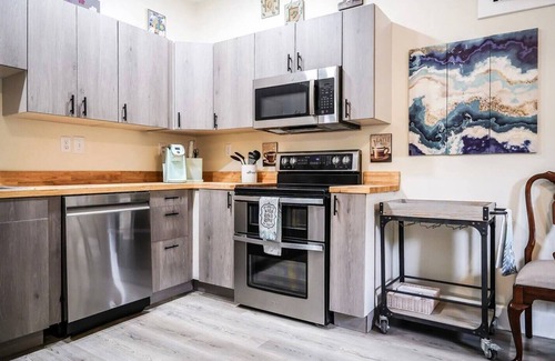 Sandusky Apartment | Coastal Purple: Minutes to Cedar Point & Sports Complex! Sleeps 9