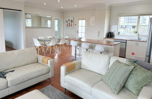 Kilcunda House | Coastal Sanctuary, Pet Firendly with Fireplace, wood provided Just 50m to Kilcunda Beach and 100m to the Ocean View Hotel The Sticks and Copper Door Kitchen Accessibility Friendly