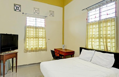 Tanjung Uncang Hotel | Collection O 91499 John Lebron House