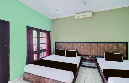 Cokroaminto Hotel | Collection O Bali near Terminal Ubung formerly Batukaru Garden Hotel