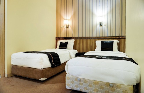 Palembang Hotel | Collection O R.Sukamto Near Palembang Trade Center Mall