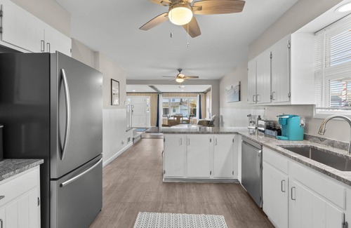 West Haven House | Colonial steps from beach: 3BR, 2BA Oasis with Hot Tub