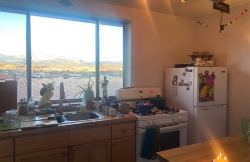 Tyrone House | Colorful & cozy adobe perched up in Chihuahua Hill with great views!