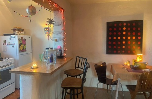 Tyrone House | Colorful & cozy adobe perched up in Chihuahua Hill with great views!