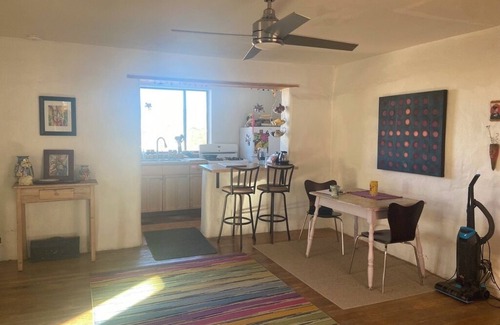 Tyrone House | Colorful & cozy adobe perched up in Chihuahua Hill with great views!