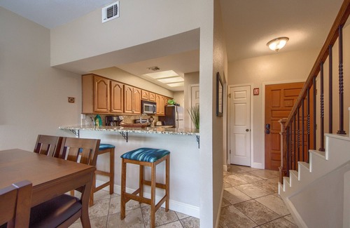 New Braunfels Condo | Comal Riverfront with 2 decks! Schlitterbahn! Pool, hot tub & river access!