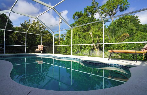 Sebastian Highlands House | Come Home to Paradise….nScreened in pool with covered lanai and hot tub