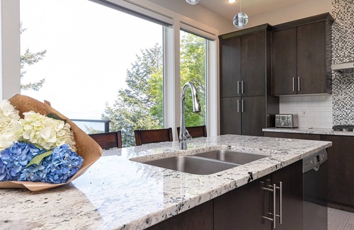 Cordova Bay House | Come on in, the water view is waiting for you.